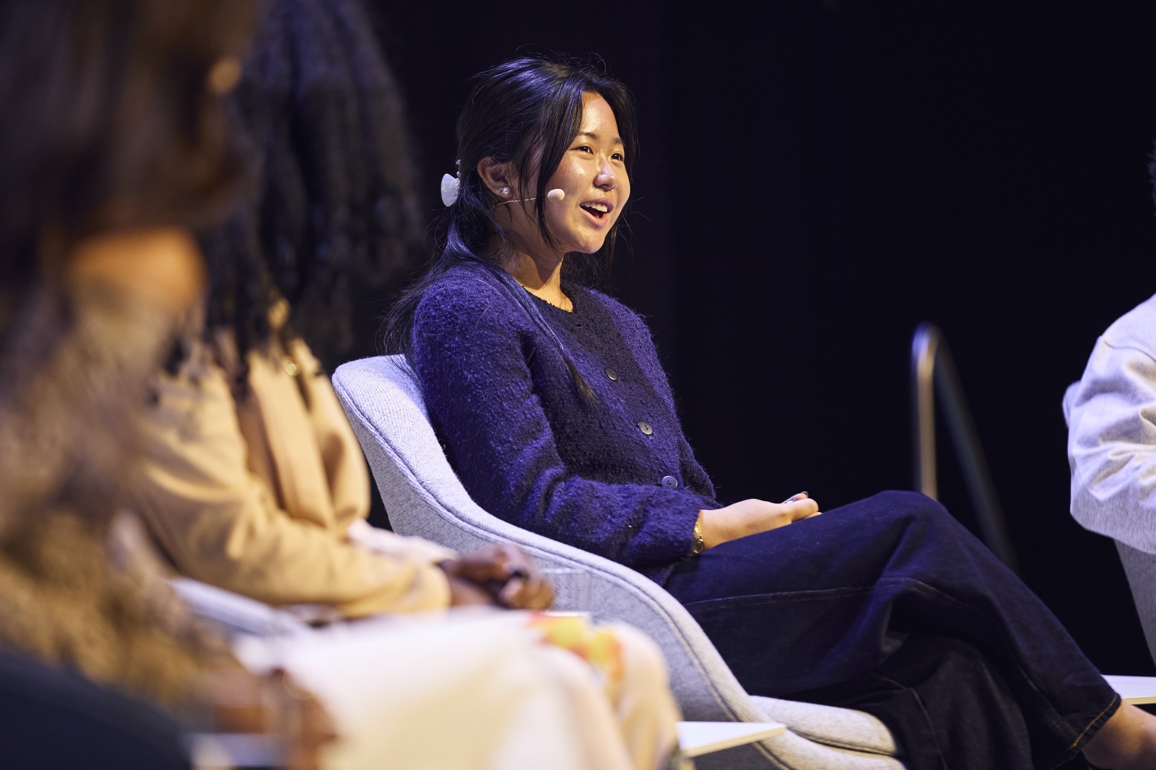 Emily Cho speaking on a panel at the EF Global Leadership Summit